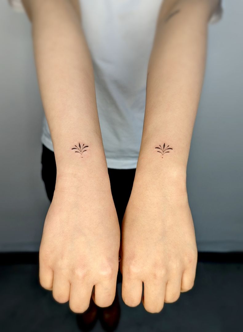 minimal symmetrical tattoo