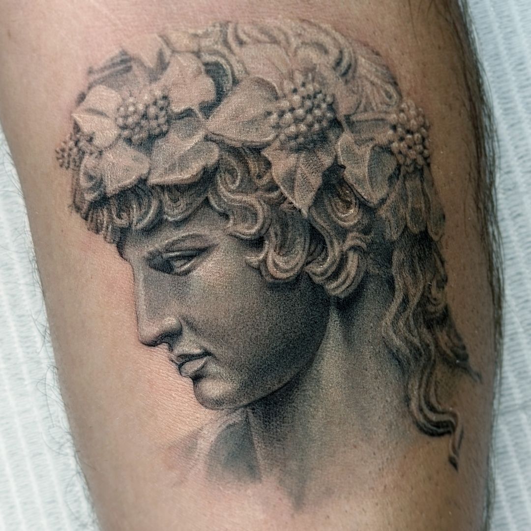 dionysus statue tattoo