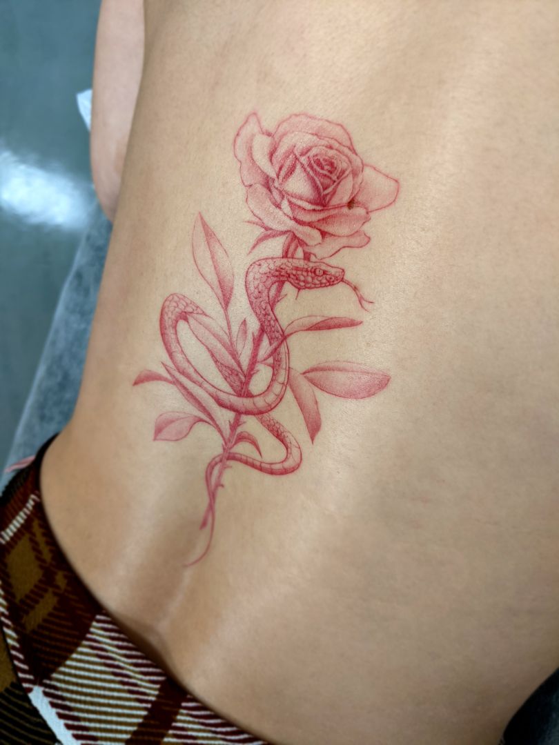 snake flower tattoo
