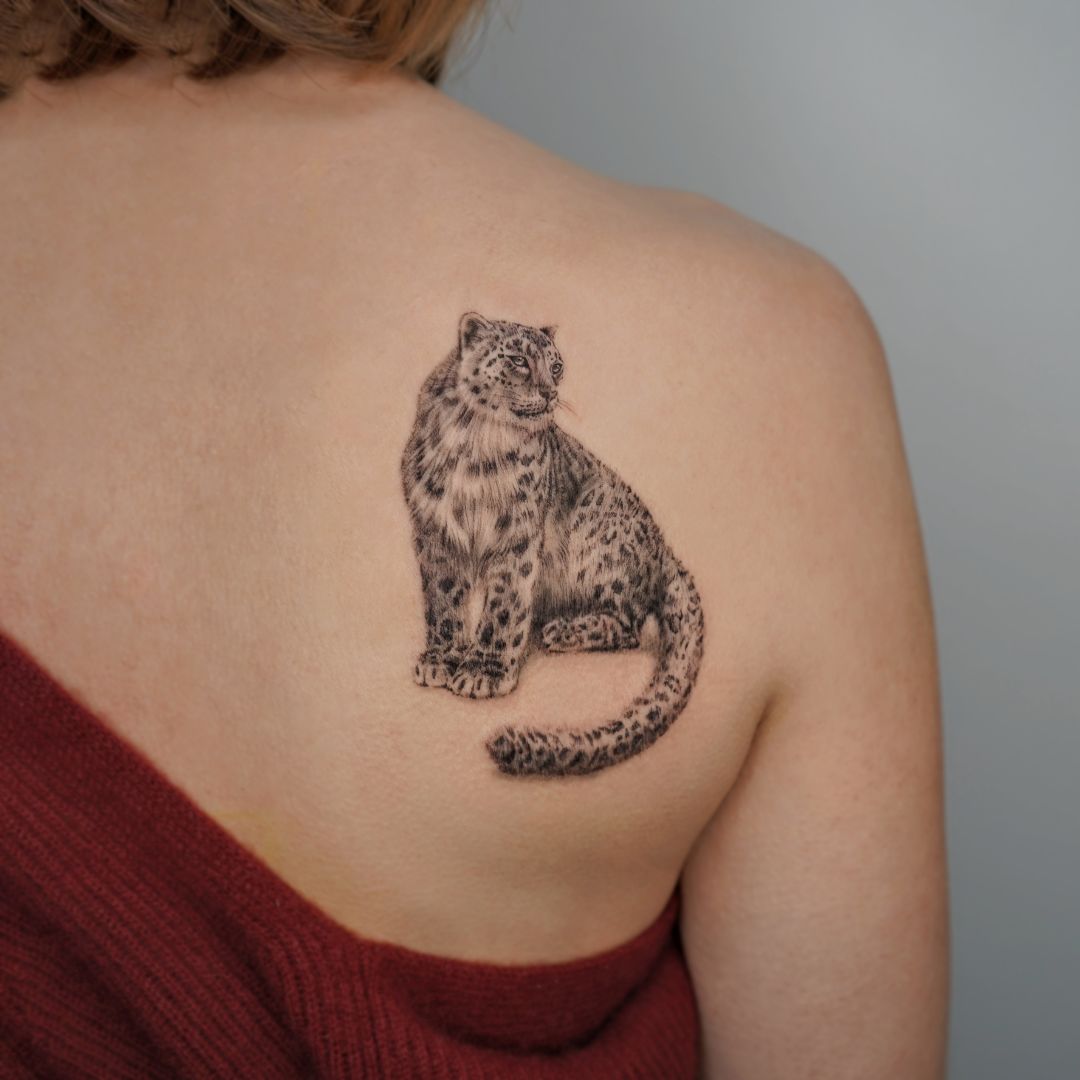 snow leopard tattoo